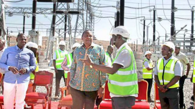 Energy Cabinet Secretary Charles Keter shares a point on the Turkana Wind Power project in Marsabit County to President Uhuru Kenyatta and Deputy President William Ruto during its inauguration on July 18,2019. PHOTO | FILE | NATION MEDIA GROUP